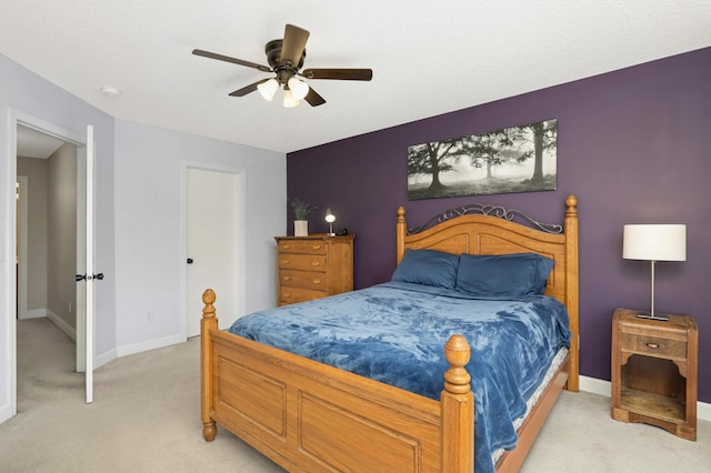 8783 Hastings Cir NE, Blaine, MN 55449 - bedroom featuring light colored carpet, baseboards, and ceiling fan