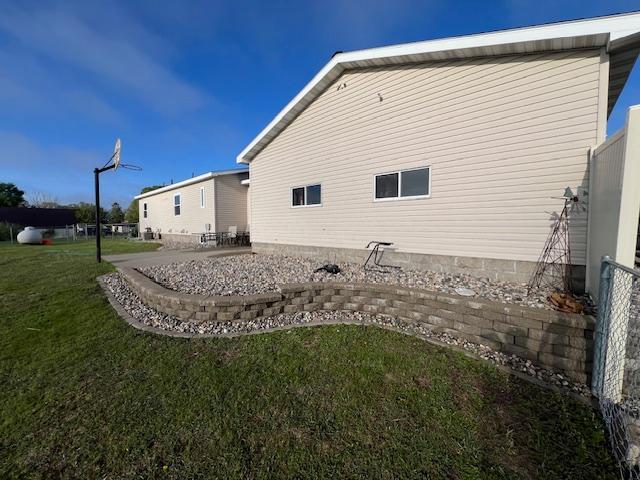 42626 County Highway 125, Perham Twp, MN 56573 - rear view of property with a lawn