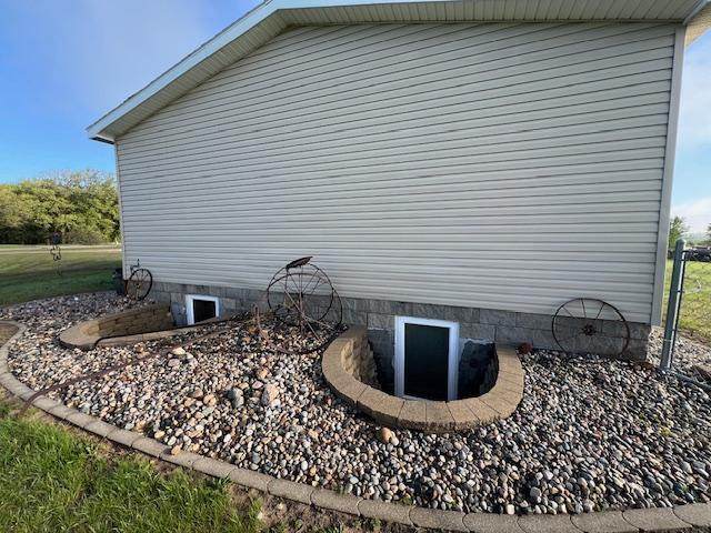 42626 County Highway 125, Perham Twp, MN 56573 - view of side of home with crawl space