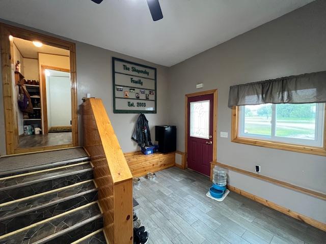 42626 County Highway 125, Perham Twp, MN 56573 - foyer with a ceiling fan, wood finished floors, and baseboards