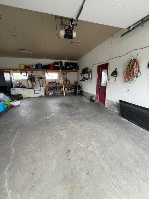 42626 County Highway 125, Perham Twp, MN 56573 - garage with a garage door opener