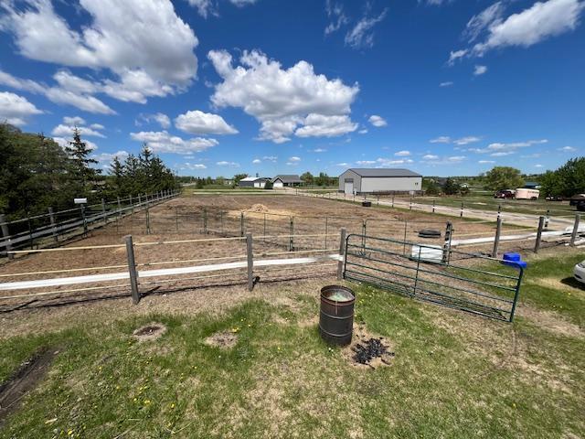 42626 County Highway 125, Perham Twp, MN 56573 - view of yard with a view of countryside and an outbuilding