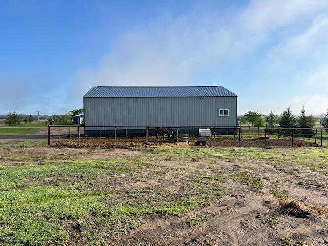 42626 County Highway 125, Perham Twp, MN 56573 - view of pole building featuring a view of countryside