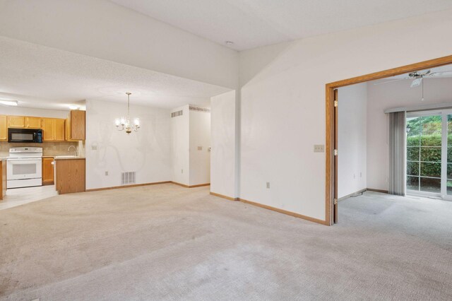 8733 Baxter Way Unit 47, Inver Grove Heights, MN 55076 - unfurnished living room with a chandelier and light colored carpet