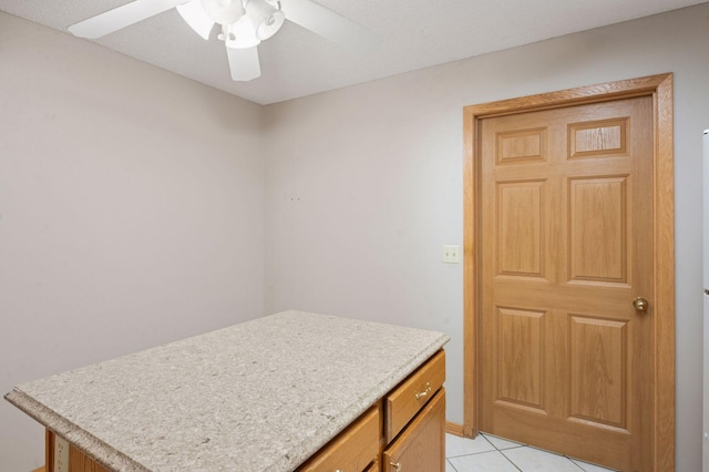 8733 Baxter Way Unit 47, Inver Grove Heights, MN 55076 - laundry room featuring ceiling fan and light tile patterned flooring