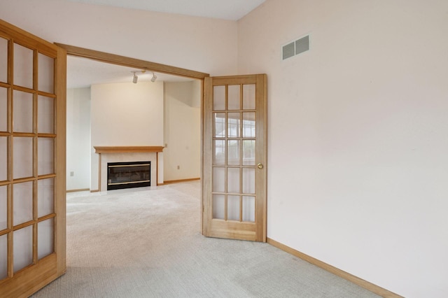 8733 Baxter Way Unit 47, Inver Grove Heights, MN 55076 - unfurnished living room featuring carpet floors and a fireplace with flush hearth
