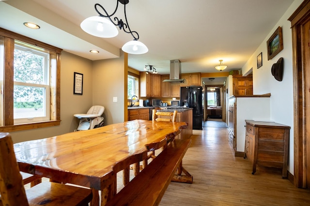 642 4th St, Turtle Lake, WI 54004 - dining space featuring healthy amount of natural light, light wood-style floors, recessed lighting, and baseboards