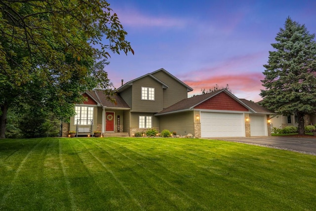 1279 146th Ln NW, Andover, MN 55304 - view of front facade featuring an attached garage, driveway, and a yard