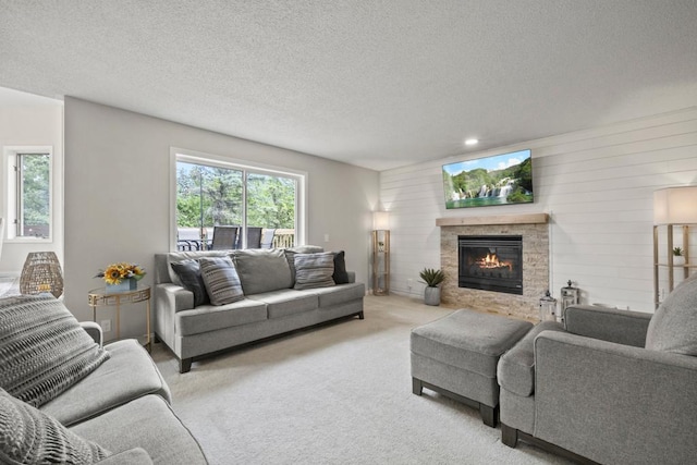 1279 146th Ln NW, Andover, MN 55304 - carpeted living area with a tile fireplace, a textured ceiling, wood walls, and recessed lighting