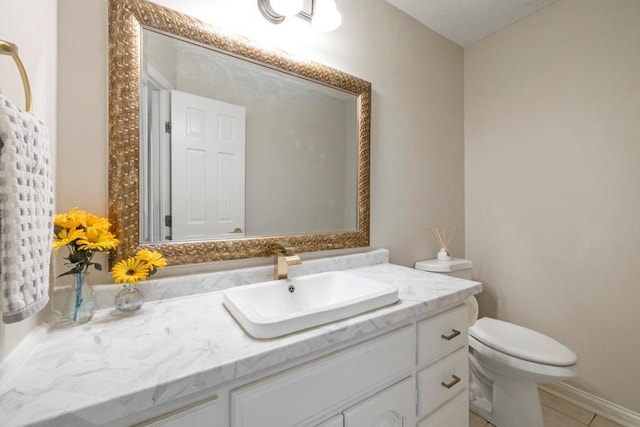 1279 146th Ln NW, Andover, MN 55304 - bathroom with vanity, toilet, and tile patterned floors