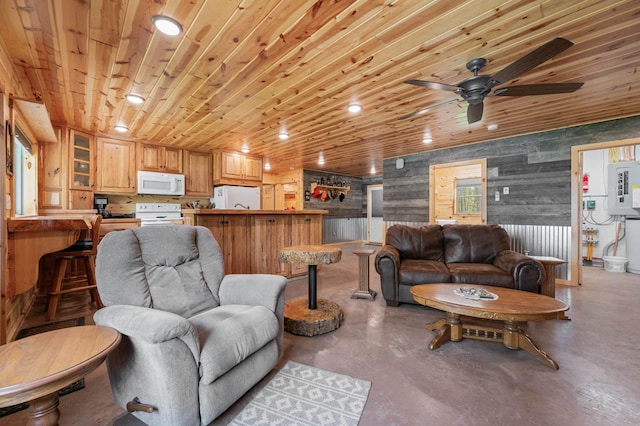 52852 Brush Shanty Lake Rd, Bigfork, MN 56628 - living area featuring finished concrete floors and a ceiling fan
