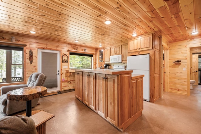 52852 Brush Shanty Lake Rd, Bigfork, MN 56628 - kitchen featuring white appliances, concrete flooring, wood ceiling, a kitchen island, and wood walls