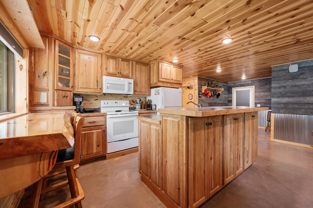 52852 Brush Shanty Lake Rd, Bigfork, MN 56628 - kitchen with white appliances, concrete floors, a center island, wood ceiling, and glass insert cabinets