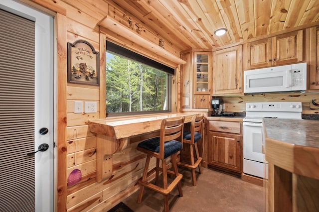 52852 Brush Shanty Lake Rd, Bigfork, MN 56628 - kitchen featuring white appliances, finished concrete flooring, wood ceiling, and glass insert cabinets
