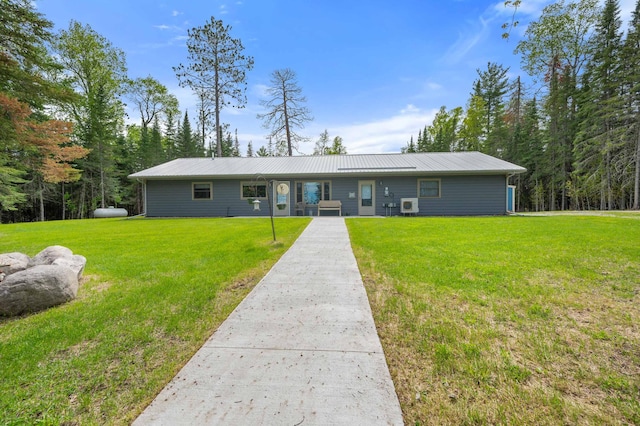 52852 Brush Shanty Lake Rd, Bigfork, MN 56628 - single story home with a front lawn and metal roof