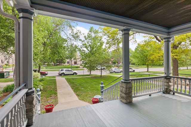 776 Summit Ave, Saint Paul, MN 55105 - wooden porch with a yard