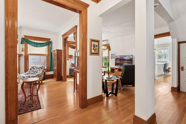 776 Summit Ave, Saint Paul, MN 55105 - hallway featuring light wood finished floors and ornamental molding