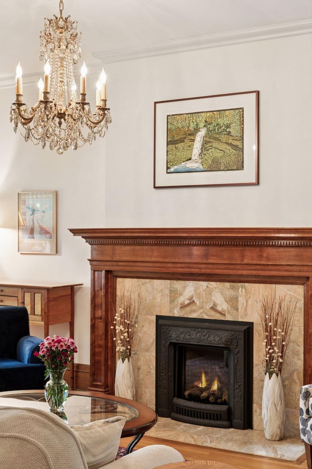 776 Summit Ave, Saint Paul, MN 55105 - living room featuring a chandelier, crown molding, and a premium fireplace