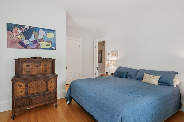 776 Summit Ave, Saint Paul, MN 55105 - bedroom featuring hardwood / wood-style flooring and baseboards