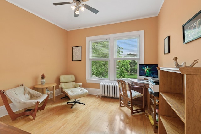 776 Summit Ave, Saint Paul, MN 55105 - office area featuring radiator heating unit, wood-type flooring, crown molding, and a ceiling fan