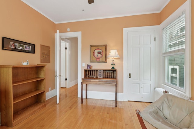 776 Summit Ave, Saint Paul, MN 55105 - sitting room featuring radiator, ornamental molding, light wood-type flooring, and ceiling fan