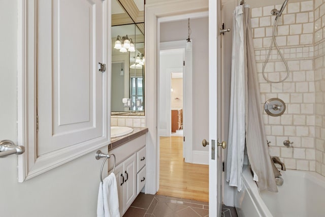 776 Summit Ave, Saint Paul, MN 55105 - full bathroom with tile patterned flooring, shower / bath combo, vanity, and a chandelier