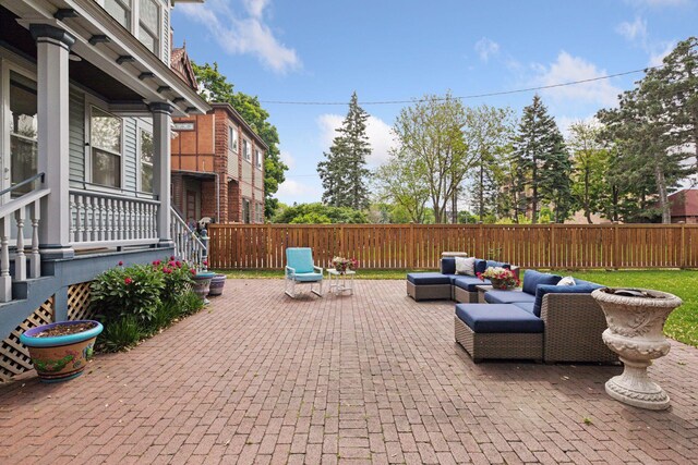 776 Summit Ave, Saint Paul, MN 55105 - fenced backyard featuring an outdoor hangout area and a patio
