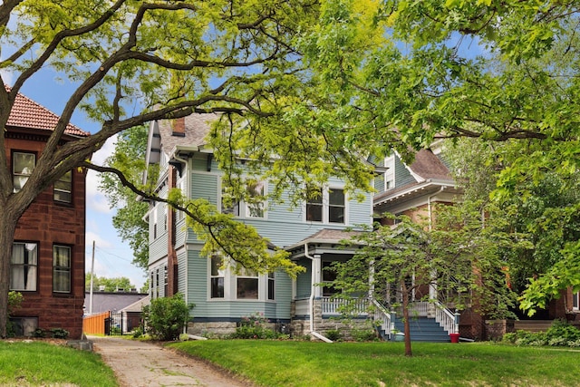 776 Summit Ave, Saint Paul, MN 55105 - view of front of home featuring a front lawn and a porch
