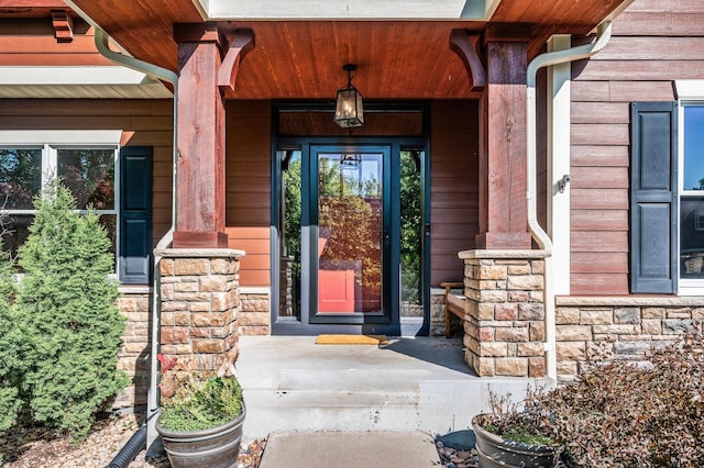 6415 Queensland Ln N, Maple Grove, MN 55311 - entrance to property with stone siding and covered porch