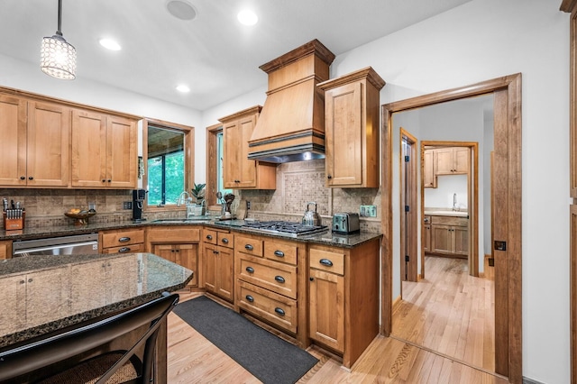 6415 Queensland Ln N, Maple Grove, MN 55311 - kitchen with premium range hood, decorative backsplash, light wood-style flooring, stainless steel appliances, and recessed lighting