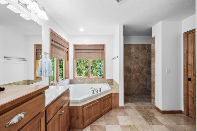 6415 Queensland Ln N, Maple Grove, MN 55311 - bathroom featuring a garden tub, a tile shower, vanity, baseboards, and recessed lighting