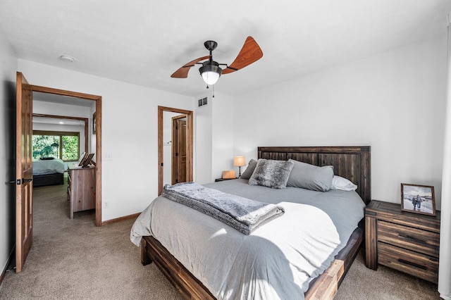 6415 Queensland Ln N, Maple Grove, MN 55311 - bedroom featuring light carpet, ceiling fan, and baseboards