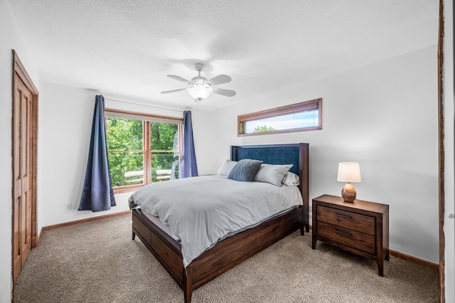 6415 Queensland Ln N, Maple Grove, MN 55311 - carpeted bedroom featuring baseboards and ceiling fan