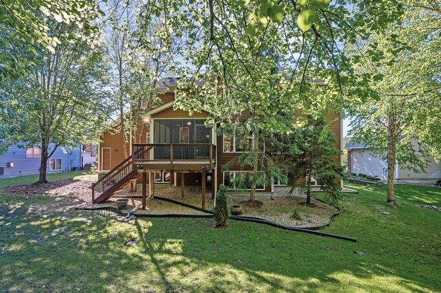 6415 Queensland Ln N, Maple Grove, MN 55311 - view of play area featuring a sunroom, stairs, and a yard