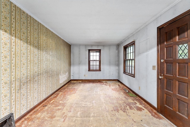 3032 County Road H2, Mounds View, MN 55112 - spare room with baseboards and crown molding