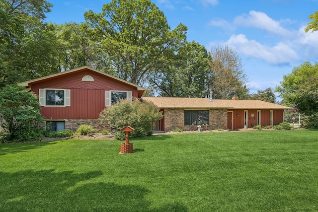 2216 146th Ave NE, Ham Lake, MN 55304 - split level home with a front yard and brick siding