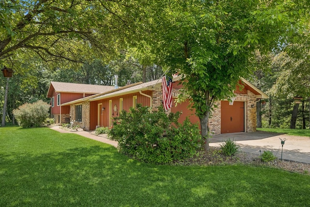 2216 146th Ave NE, Ham Lake, MN 55304 - view of front facade with a garage, driveway, and a front yard