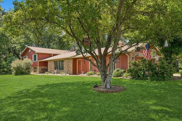 2216 146th Ave NE, Ham Lake, MN 55304 - view of front of property with a front lawn and a chimney