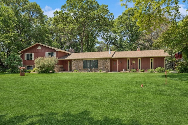 2216 146th Ave NE, Ham Lake, MN 55304 - view of front of house with a chimney and a front lawn