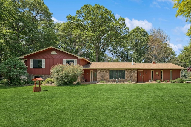 2216 146th Ave NE, Ham Lake, MN 55304 - split level home with a front yard, brick siding, and a shingled roof