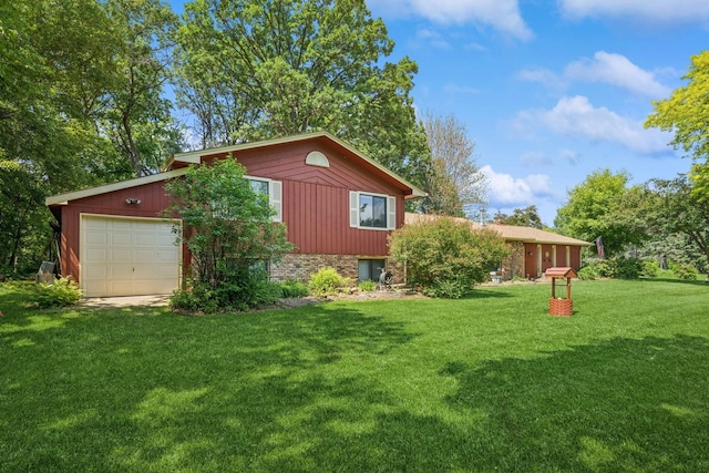 2216 146th Ave NE, Ham Lake, MN 55304 - view of grassy yard with an attached garage
