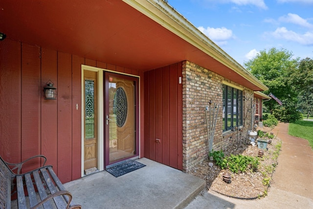 2216 146th Ave NE, Ham Lake, MN 55304 - property entrance featuring brick siding and board and batten siding