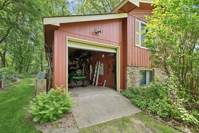 2216 146th Ave NE, Ham Lake, MN 55304 - garage featuring concrete driveway