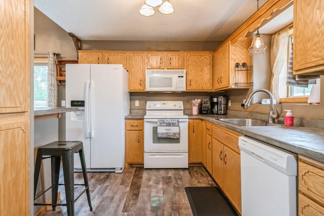 360 12th St NE, Milaca, MN 56353 - kitchen with white appliances, a sink, wood finished floors, and a textured ceiling