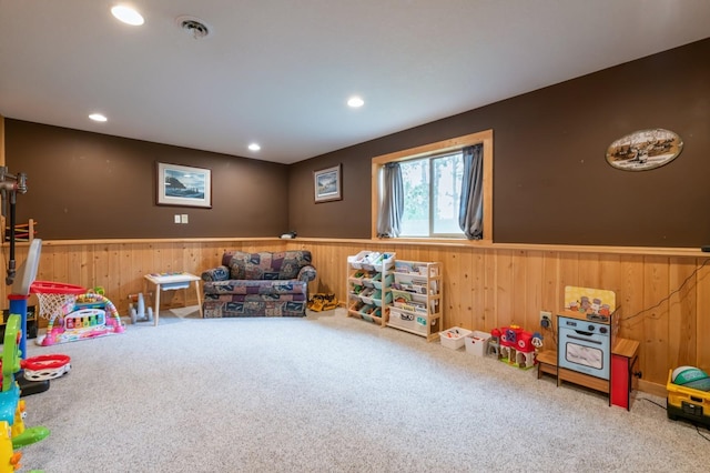 360 12th St NE, Milaca, MN 56353 - recreation room with wooden walls, carpet floors, wainscoting, and recessed lighting