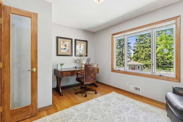 15905 43rd Ave N, Plymouth, MN 55446 - home office featuring light wood-type flooring and baseboards