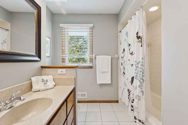 15905 43rd Ave N, Plymouth, MN 55446 - full bathroom featuring tile patterned floors, vanity, shower / bathtub combination with curtain, and baseboards