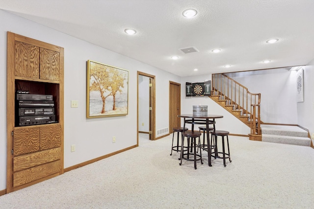 15905 43rd Ave N, Plymouth, MN 55446 - carpeted dining area featuring stairway, baseboards, recessed lighting, and a textured ceiling