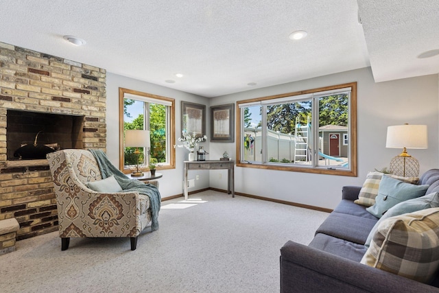 15905 43rd Ave N, Plymouth, MN 55446 - living room with carpet flooring, a textured ceiling, baseboards, and a brick fireplace
