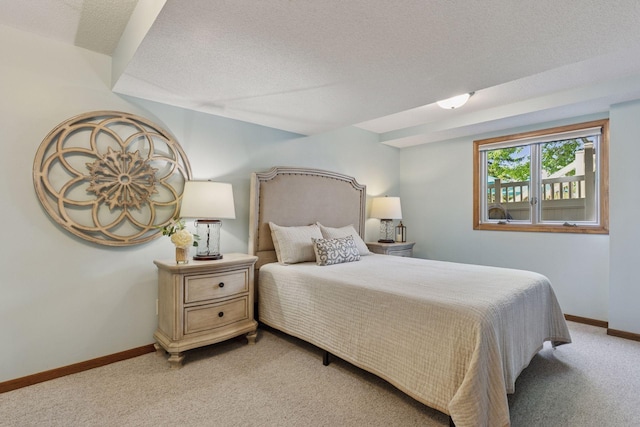 15905 43rd Ave N, Plymouth, MN 55446 - bedroom with light colored carpet, baseboards, and a textured ceiling